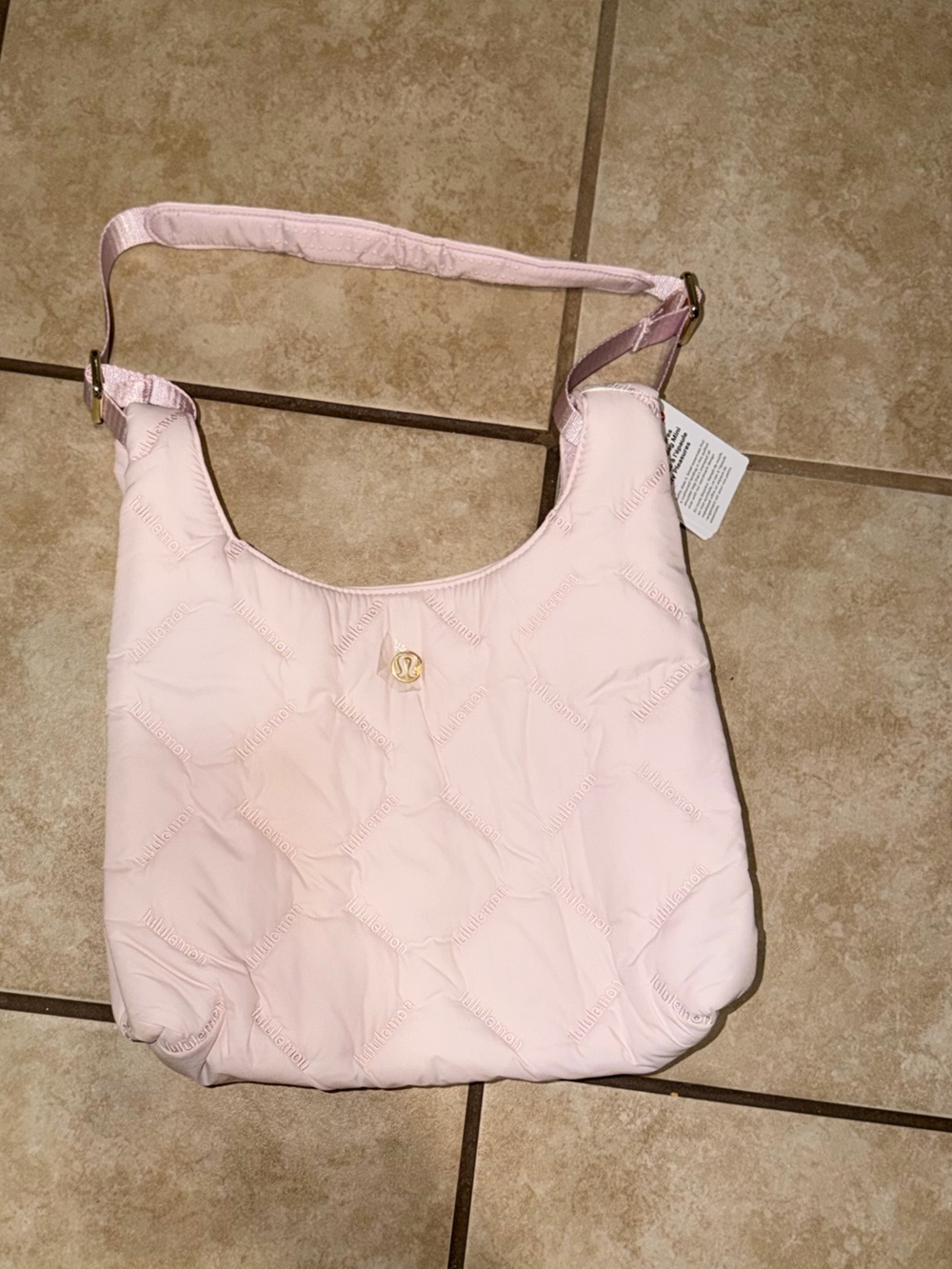Lululemon Quilty Pleasures Shoulder Bag in a quilted, light pink NWT